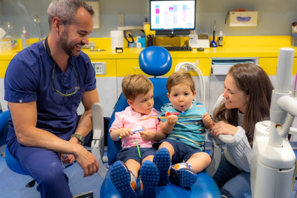 Pediatric Dentist Rittenhouse Square 1 A Pediatric Dentist Greeting Two Toddlers And Their Mom At Cobblestone Kids