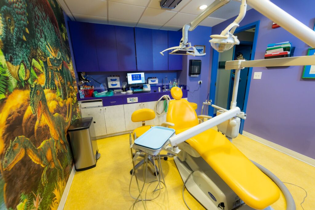 Pediatric Dentist Mount Laurel 1 A Kid-Friendly Treatment Room With A Dinosaur Mural At Cobblestone Kids Pediatric Dentistry