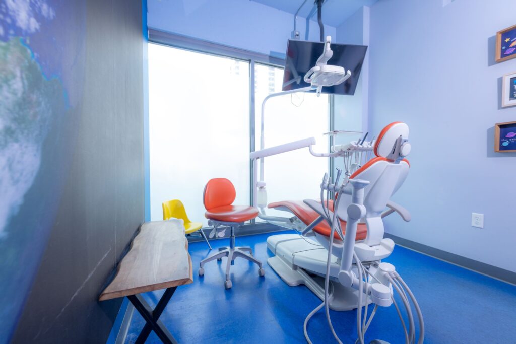 Bright Treatment Room With A Ceiling Tv