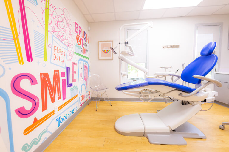 Pediatric Dentist In Cherry Hill, Nj 8 A Treatment Chair Beside A Colorful Smile Mural At Our Kids Dental Office In Cherry Hill, Nj